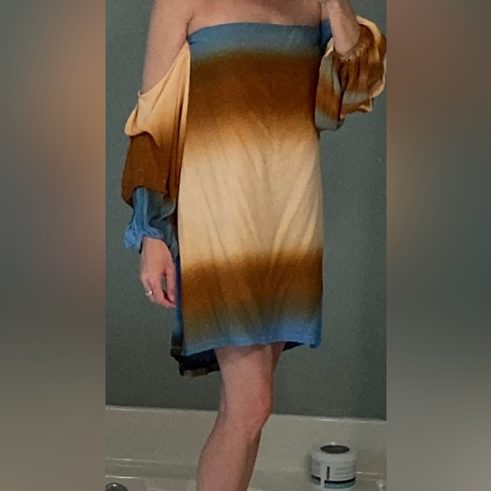 NWT!  Never worn- Beautiful MLM Label dress Med. Hidden pockets. Elastic back.